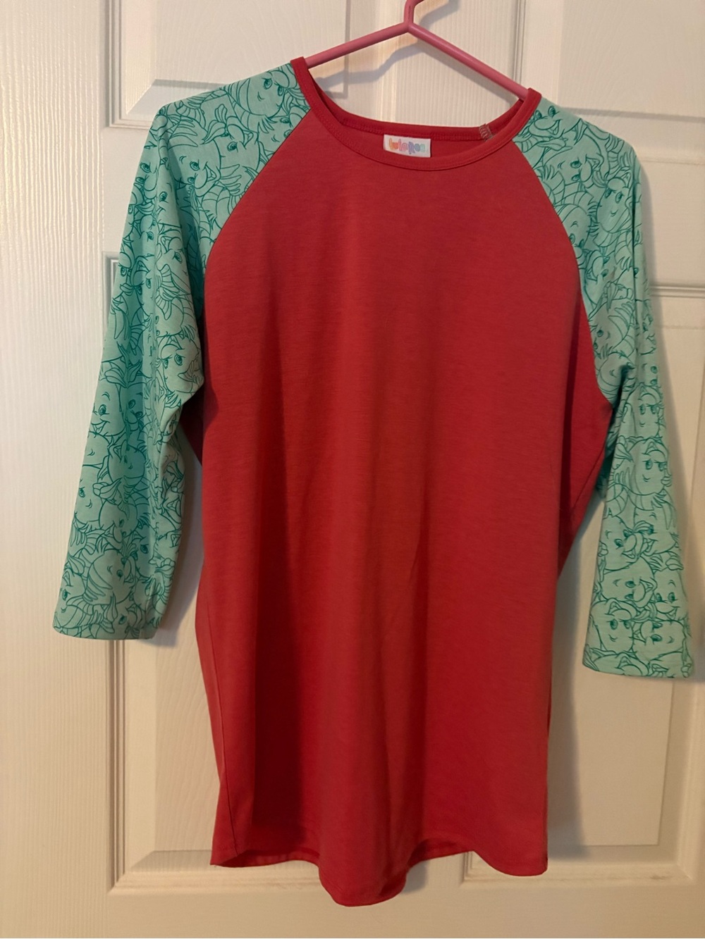 LuLaRoe Disney Flounder Coral Red Raglan Tee with Mint Printed Sleeves